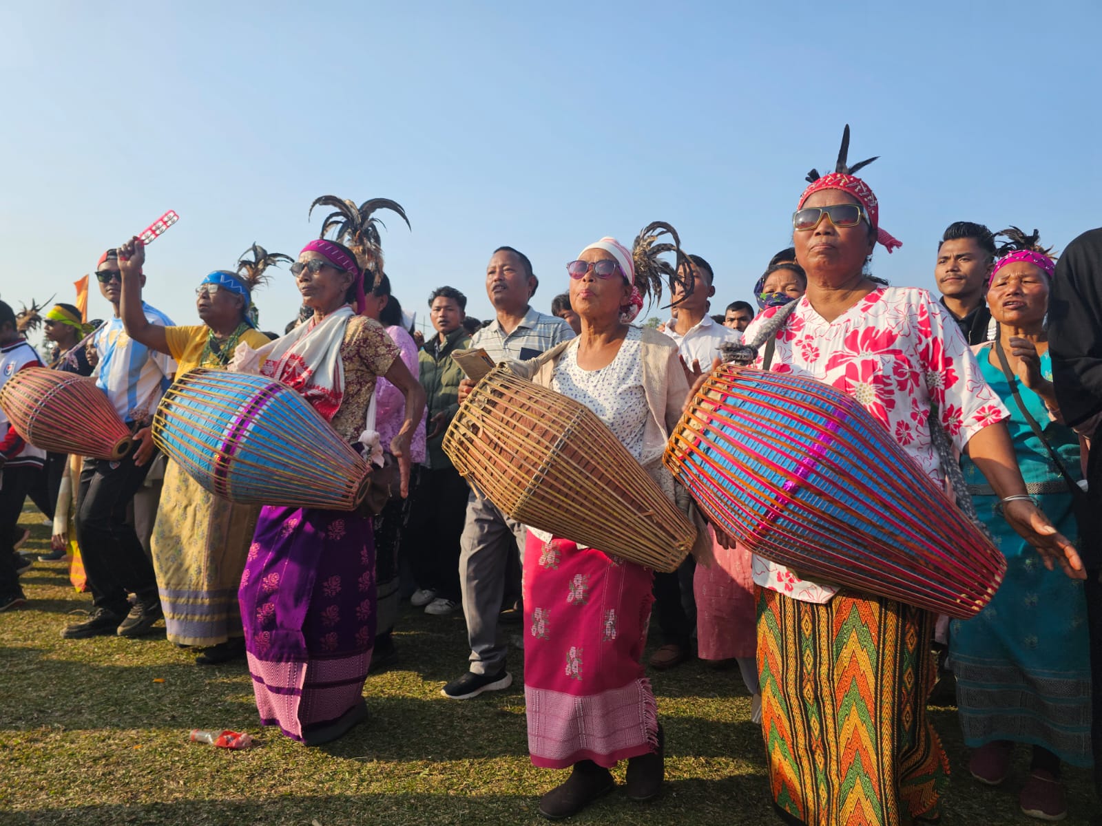 A massive celebration marked the Garo New Year 2026, bringing together thousands of people from across India and even international visitors to the Bangsi Apal playground in North Garo Hills. The festival showcased the rich cultural heritage of the Garo community and was especially notable for its vibrant drumming and traditional dances.  The festivities began early in the morning around 9 AM, as the first beats of the drums echoed through the area, drawing crowds eager to join the celebration. Women, taking center stage, played powerful drum rhythms that energized the participants. Men, women, and young people danced together to the pulsating beats, creating a lively and colorful atmosphere.  By noon, hundreds of thousands of people were seen dancing and celebrating in unison, marking one of the largest gatherings for the Garo New Year in recent years. The event not only highlighted the community’s artistic traditions but also reinforced unity, joy, and cultural pride among participants.  Organizers said the festival aims to preserve tribal customs while providing a platform for cultural exchange, as many visitors from outside the region attended and participated. The 2026 celebration of the Garo New Year was hailed as a grand success, leaving lasting memories for all who attended.