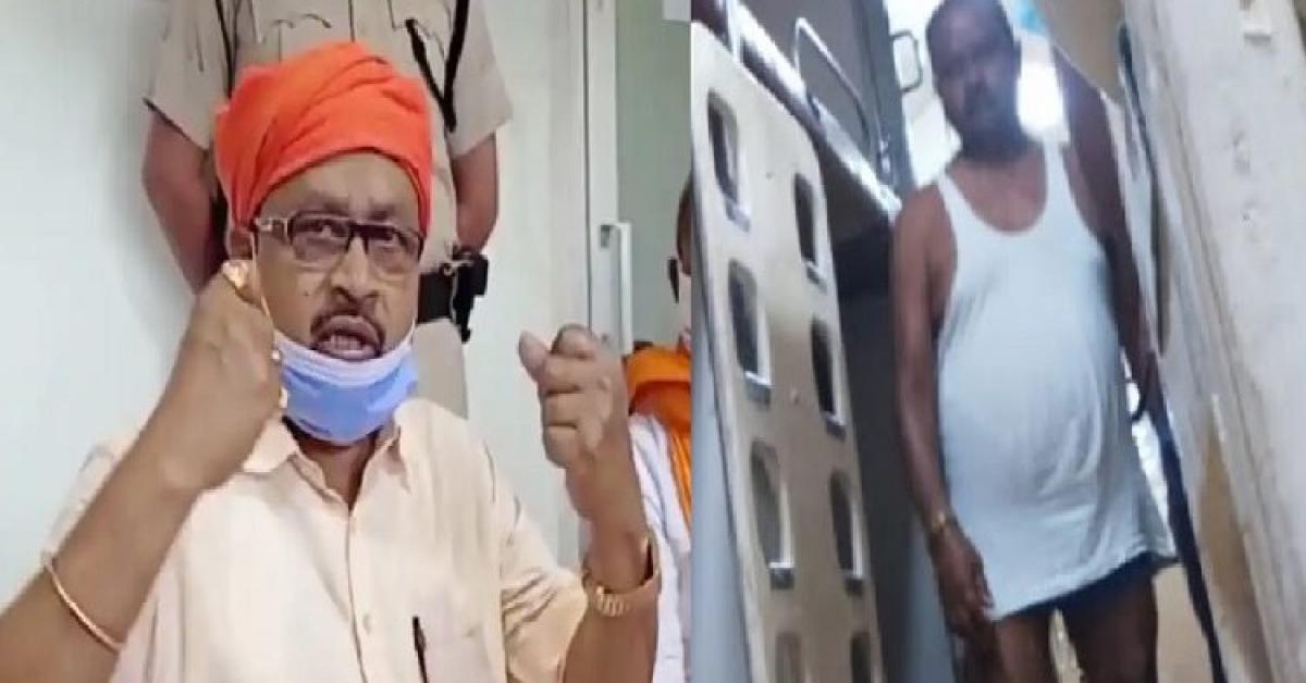 The MLA walks from head to head on the train half naked!